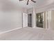 Spacious bedroom with a sliding glass door and a view to the backyard at 10225 W Camelback Rd # 3, Phoenix, AZ 85037
