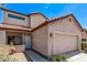 Charming two-story home with desert landscaping, red tile roof and attached two car garage at 10225 W Camelback Rd # 3, Phoenix, AZ 85037