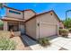Charming two-story home with desert landscaping, red tile roof and attached two car garage at 10225 W Camelback Rd # 3, Phoenix, AZ 85037