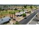 Residential neighborhood with manicured lawns, swaying palm trees and golf course views, offering a tranquil environment at 10429 W Oakmont Dr, Sun City, AZ 85351