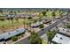Aerial view showcasing a well-maintained neighborhood adjacent to a lush green golf course, blending leisure and lifestyle at 10429 W Oakmont Dr, Sun City, AZ 85351