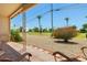Relax on the covered patio while enjoying the views of the meticulously maintained backyard at 10429 W Oakmont Dr, Sun City, AZ 85351