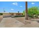 Charming single-story home boasts a well-maintained front yard with mature landscaping and a two-car garage at 10429 W Oakmont Dr, Sun City, AZ 85351