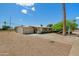 Charming single-story home boasts a well-maintained front yard with mature landscaping and a two-car garage at 10429 W Oakmont Dr, Sun City, AZ 85351