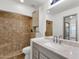 Bathroom with tile shower, vanity with stone countertop and neutral color scheme at 1126 W Elliot Rd # 2040, Chandler, AZ 85224