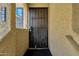Exterior shot of a security screen door at the entry to unit 2040 of an apartment complex at 1126 W Elliot Rd # 2040, Chandler, AZ 85224