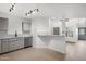 Bright, open kitchen with stainless steel appliances and eat-in bar area, perfect for modern living at 1126 W Elliot Rd # 2040, Chandler, AZ 85224