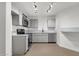 Modern kitchen featuring stainless steel appliances, and sleek cabinetry, offering a stylish space at 1126 W Elliot Rd # 2040, Chandler, AZ 85224