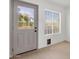 Sunlit room with a window and outdoor access, ideal for a cozy workspace or sunroom at 1126 W Elliot Rd # 2040, Chandler, AZ 85224