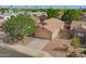 A well-maintained single-Gathering home with an attached two-car garage in a serene neighborhood at 11359 E Elena Ave, Mesa, AZ 85208
