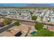 Desert community aerial view highlights neighborhood street layout and the distant mountain views at 11359 E Elena Ave, Mesa, AZ 85208