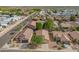A neighborhood aerial view showcases well-maintained homes, desert landscaping and community streets at 11359 E Elena Ave, Mesa, AZ 85208