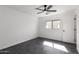Modern bedroom featuring sleek tiled flooring and a window bringing in natural light at 11359 E Elena Ave, Mesa, AZ 85208