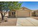 Charming single-story home with a well-manicured yard and a two-car garage at 11359 E Elena Ave, Mesa, AZ 85208