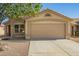 Charming single-story home with a well-manicured yard and a two-car garage at 11359 E Elena Ave, Mesa, AZ 85208