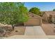 Charming single-story home with a well-maintained front yard, a two car garage, and a cozy design at 11359 E Elena Ave, Mesa, AZ 85208
