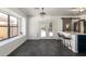 Eat-in kitchen with tile floors, a breakfast bar, pendant lights and french doors at 11359 E Elena Ave, Mesa, AZ 85208