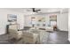 Modern living room showcases neutral tones, contemporary furniture, and stylish decor, enhancing its appeal at 11359 E Elena Ave, Mesa, AZ 85208