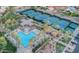 Aerial view of the community pool, spa, tennis courts, and surrounding landscaping at 11651 E Appaloosa Pl, Scottsdale, AZ 85259