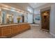 Grand bathroom boasts granite countertops, soaking tub, walk-in shower, and lots of natural light at 11651 E Appaloosa Pl, Scottsdale, AZ 85259