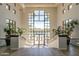 Interior view of a community building with a large window overlooking the pool at 11651 E Appaloosa Pl, Scottsdale, AZ 85259