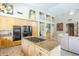 Kitchen with granite countertops, stainless steel appliances, and wooden cabinetry at 11651 E Appaloosa Pl, Scottsdale, AZ 85259