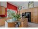 Spacious kitchen featuring granite countertops, stainless steel appliances, and center island at 11651 E Appaloosa Pl, Scottsdale, AZ 85259