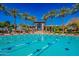 Spacious community pool with lap lanes and a clubhouse in the background at 11651 E Appaloosa Pl, Scottsdale, AZ 85259