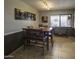 Eat-in dining room featuring neutral paint, a window, and tile flooring at 1209 W Tulane Dr, Tempe, AZ 85283
