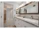 Modern bathroom with dual sinks, granite countertops, and elegant fixtures at 12805 W Colter St, Litchfield Park, AZ 85340