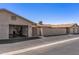 Image showcasing the exterior of a home with an attached garage and low-maintenance landscaping at 13608 W Aleppo Dr, Sun City West, AZ 85375