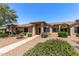 Inviting home exterior featuring a walkway, desert landscaping, and a charming covered entrance at 13608 W Aleppo Dr, Sun City West, AZ 85375