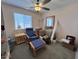 Bedroom with window and ceiling fan at 14439 N 38Th Pl, Phoenix, AZ 85032
