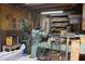 Interior view of workshop with multiple saws and a lathe machine at 14439 N 38Th Pl, Phoenix, AZ 85032