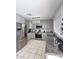 Updated kitchen featuring stainless steel appliances, granite countertops, and modern lighting at 15023 W Redfield Rd, Surprise, AZ 85379
