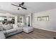 Bright, open-concept living area with comfortable furniture and modern finishes at 15028 W Minnezona Ave, Goodyear, AZ 85395