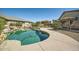 Beautiful pool surrounded by lush landscaping, perfect for relaxation and recreation at 15211 N 184Th Ct, Surprise, AZ 85388