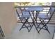 Relaxing balcony area with table and chairs, perfect for outdoor enjoyment at 1701 E Colter St # 280, Phoenix, AZ 85016