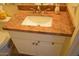 Bathroom vanity featuring granite countertops and white cabinetry at 1701 E Colter St # 280, Phoenix, AZ 85016