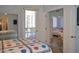 Bright bedroom with access to a balcony, showcasing a comfortable sleeping space at 1701 E Colter St # 280, Phoenix, AZ 85016