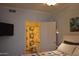 Comfortable bedroom with a view into the ensuite bathroom, offering convenience and privacy at 1701 E Colter St # 280, Phoenix, AZ 85016