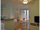 Open-concept dining room featuring a modern ceiling fan and table adjacent to the kitchen at 1701 E Colter St # 280, Phoenix, AZ 85016