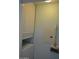 A laundry room with white washing machine, white cupboards and light blue walls at 1701 E Colter St # 280, Phoenix, AZ 85016