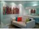 Cozy living room area with stylish sofa, modern art, and a bright, welcoming atmosphere at 1701 E Colter St # 280, Phoenix, AZ 85016