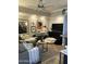 Inviting living room featuring modern decor, plush sofa, stylish accents, and entertainment center at 1701 E Colter St # 280, Phoenix, AZ 85016