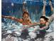 A painting shows two people swimming underwater at 1701 E Colter St # 280, Phoenix, AZ 85016