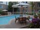 The large pool provides a relaxing and refreshing outdoor oasis with seating and greenery at 1701 E Colter St # 280, Phoenix, AZ 85016