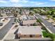 Aerial view of home displaying its backyard, roof, and attractive desert landscaping at 17912 N 88Th Dr, Peoria, AZ 85382