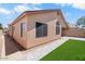 Home exterior displaying a low-maintenance yard, walkway and window coverings at 17912 N 88Th Dr, Peoria, AZ 85382