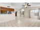 Spacious living room with lots of natural light, tile floors, and an open layout at 17912 N 88Th Dr, Peoria, AZ 85382